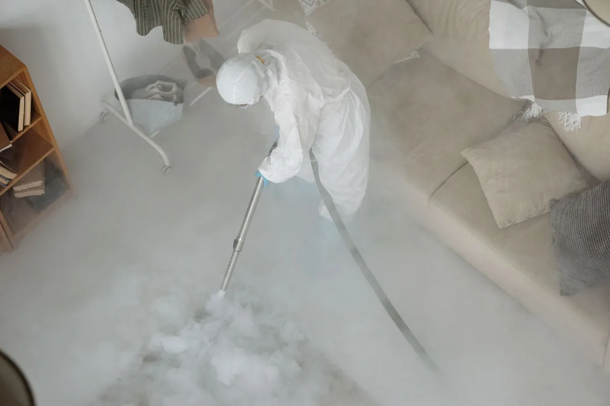 Biohazard cleanup technician in protective equipment, Mentor, OH